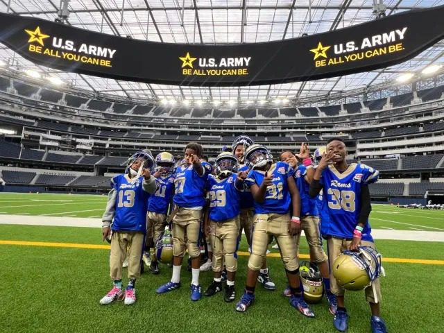 Group of young football players indoors