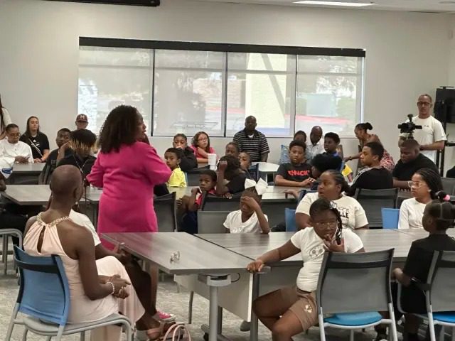 Community meeting with diverse attendees